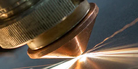 The laser-induced damage threshold in high-power laser optics